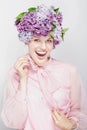 Summery picture. Girl with flowers and a big smile