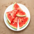 Summery refreshment Watermelon slice on white plate background, close up Royalty Free Stock Photo