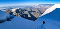 Summit ascent between combin de valsorey and combin de grafeneire on the grand combin massif. walk over glaciers