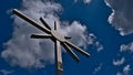 Summit cross, a Christian religious symbol, on the top of a sandstone rock near Dahn (Palatinate Forest). Royalty Free Stock Photo
