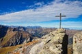 Summit cross on the Hochwart mountain in the Pizol area above the Wildsee and Batoni. Hiking in beautiful autumn.