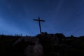 Summit cross at night, Benediktenwand mountain, Bavaria, Germany Royalty Free Stock Photo