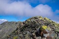 The summit of the Gaustatoppen in norway with a stony path that few dare to climb