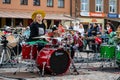 Summit of small drummers in the historic Dobele Market Square, Dozens of drummers play synchronously