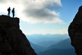 Summit struggle of leading climber, professional duo and successful explorers and stunning views Royalty Free Stock Photo