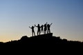 Summit successful family group in the mountains