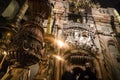 The sumptuousness interior and of burning candles of the Church of Holy Sepulchre, Jerusalem, Israel: October 24, 2018