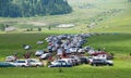 Parking cars, walking pilgrims during the Pentecostal celebration.