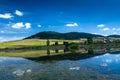 Sumuleu mountain reflecting in a small pond, one f the most visited places by pilgrims in Eastern Europe. Royalty Free Stock Photo