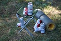 SUMY, UKRAINE - AUGUST 01, 2021: Few Cans of Budweiser Lager Alcohol Beer on fisherman chair outdoors. Budweiser is a Brand from