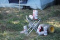 SUMY, UKRAINE - AUGUST 01, 2021: Few Cans of Budweiser Lager Alcohol Beer on fisherman chair outdoors. Budweiser is a Brand from