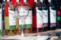 Sumy, Ukraine - August 25, 2019. The second wine festival in Sumy. An empty wine glass stands on a table