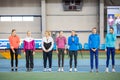 SUMY, UKRAINE - FEBRUARY 22, 2020: announcing sportswomen in final high jump contest at Ukrainian indoor track and field Royalty Free Stock Photo