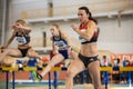SUMY, UKRAINE - FEBRUARY 21, 2020: Hanna Kasyanova, pentathlon athlete, on hurdles sprint at Ukrainian indoor track and Royalty Free Stock Photo