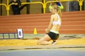 SUMY, UKRAINE - FEBRUARY 9, 2018: Hanna Nelepa performing long jump attempt in pentathlon competition on Ukrainian Royalty Free Stock Photo