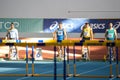 SUMY, UKRAINE - FEBRUARY 21, 2020: Heptathlon athletes on hurdles sprint at Ukrainian indoor track and field Royalty Free Stock Photo