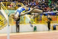 SUMY, UKRAINE - FEBRUARY 18, 2017: Klintsova Liliia performing high jump in final competition on Ukrainian indoor track and field Royalty Free Stock Photo