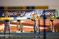 SUMY, UKRAINE - FEBRUARY 21, 2020: Pentathlon athletes on hurdles sprint at Ukrainian indoor track and field Royalty Free Stock Photo