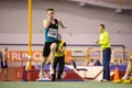 SUMY, UKRAINE - FEBRUARY 21, 2020: sportsman running in long jump attempt at Ukrainian indoor track and field Royalty Free Stock Photo