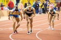 SUMY, UKRAINE - FEBRUARY 21, 2020: sportswomen running 800m race at Ukrainian indoor track and field championship 2020