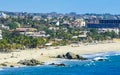 Sun beach sand surfer waves palms in Puerto Escondido Mexico