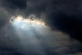 Sun Beam in Dark Clouds and Sky