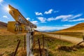 Sun Beams Down On The Hakataramea Pass Sign