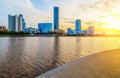 Sun and the beautiful sunset over the city center and city pond of Yekaterinburg in summer Royalty Free Stock Photo