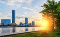 Sun and the beautiful sunset over the city center and city pond of Yekaterinburg in summer Royalty Free Stock Photo