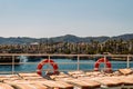 Sun beds and lifebuoys on the ship