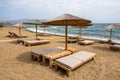 Sun beds and umbrellas at Soros beach