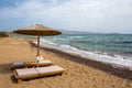 Sun beds and umbrellas at Soros beach on Antiparos