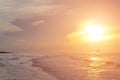 The sun began to rise from the sea in the morning. Royalty Free Stock Photo