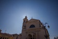 Sun behind the bell tower. Royalty Free Stock Photo