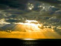 Sun behind clouds like god was under the sea Royalty Free Stock Photo