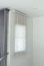 Sun-blocking blinds are hung on the windows Royalty Free Stock Photo