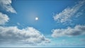 Sun on the blue sky with moving clouds in the day time Royalty Free Stock Photo
