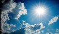 sun in the blue sky with white clouds and sunbeams. Royalty Free Stock Photo