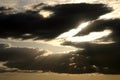 Sun breaking through the clouds. Royalty Free Stock Photo