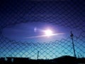 Sun Through Broken Fence Royalty Free Stock Photo