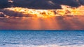 Sun bursting through storm clouds at sunset, Santa Cruz, California Royalty Free Stock Photo