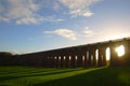 The sun casting long shadows at the Balcombe Viaduct across the River Ouse
