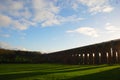 The sun casting long shadows at the Balcombe Viaduct across the River Ouse