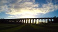 The sun casting long shadows at the Balcombe Viaduct across the River Ouse