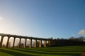 The sun casting long shadows at the Balcombe Viaduct across the River Ouse