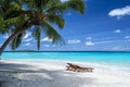 Sun chairs on beach in Maldives in winter Royalty Free Stock Photo