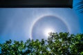 Sun with a circular rainbow,Fantastic beautiful sun halo phenomenon in Thailand Royalty Free Stock Photo