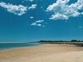 Sun Clouds Sea and Sand at Hilton Head Island during a low tide Royalty Free Stock Photo