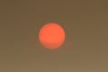 The Sun colour in the Uk was due to a weather phenomenon, Saharan dust, blown in by ex-hurricane Ophelia and also from debris, cau