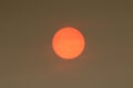 The Sun colour in the Uk was due to a weather phenomenon, Saharan dust, blown in by ex-hurricane Ophelia and also from debris, cau